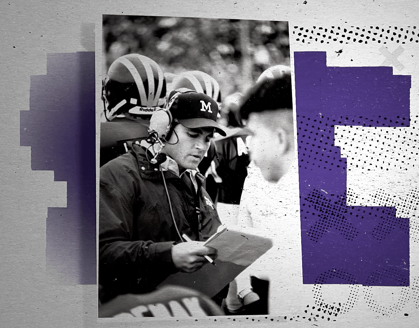 Young Les Miles reads from a clipboard during a football game in black and white
