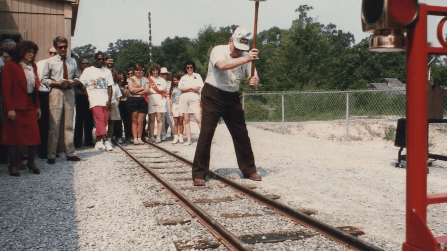 BREC employee hammers the final train track in BREC