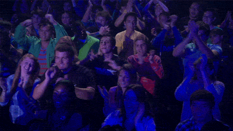 People clapping in a movie theater