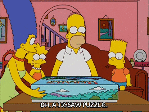 Homer Simpson is unenthused with his present of a puzzle